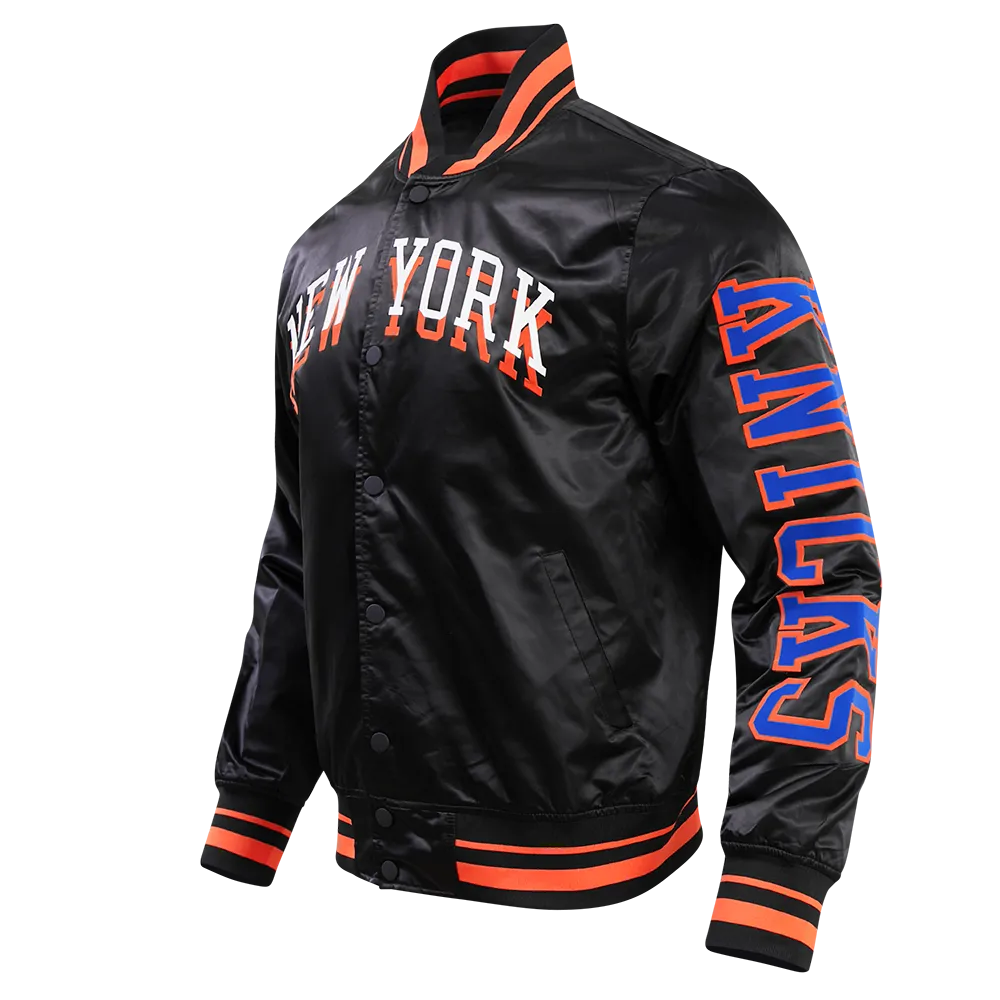NBA NEW YORK KNICKS CHEST MEN'S LAYERED RIB SATIN JACKET (BLACK/ORANGE)