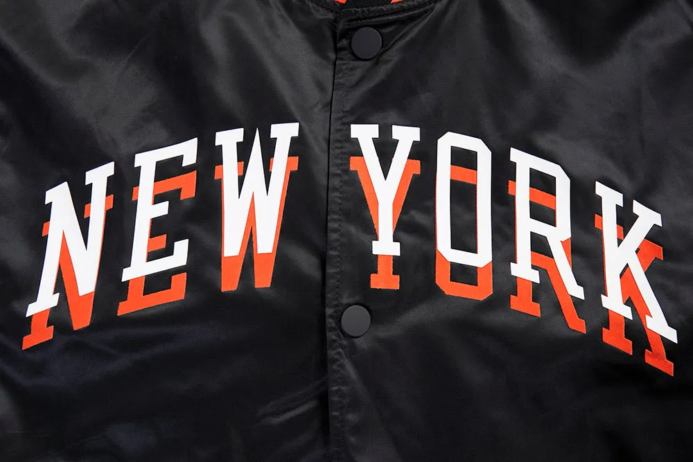 NBA NEW YORK KNICKS CHEST MEN'S LAYERED RIB SATIN JACKET (BLACK/ORANGE)